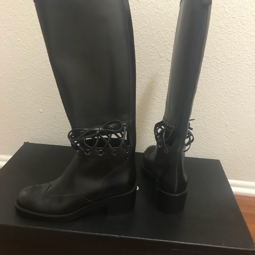 Chanel knee boots.